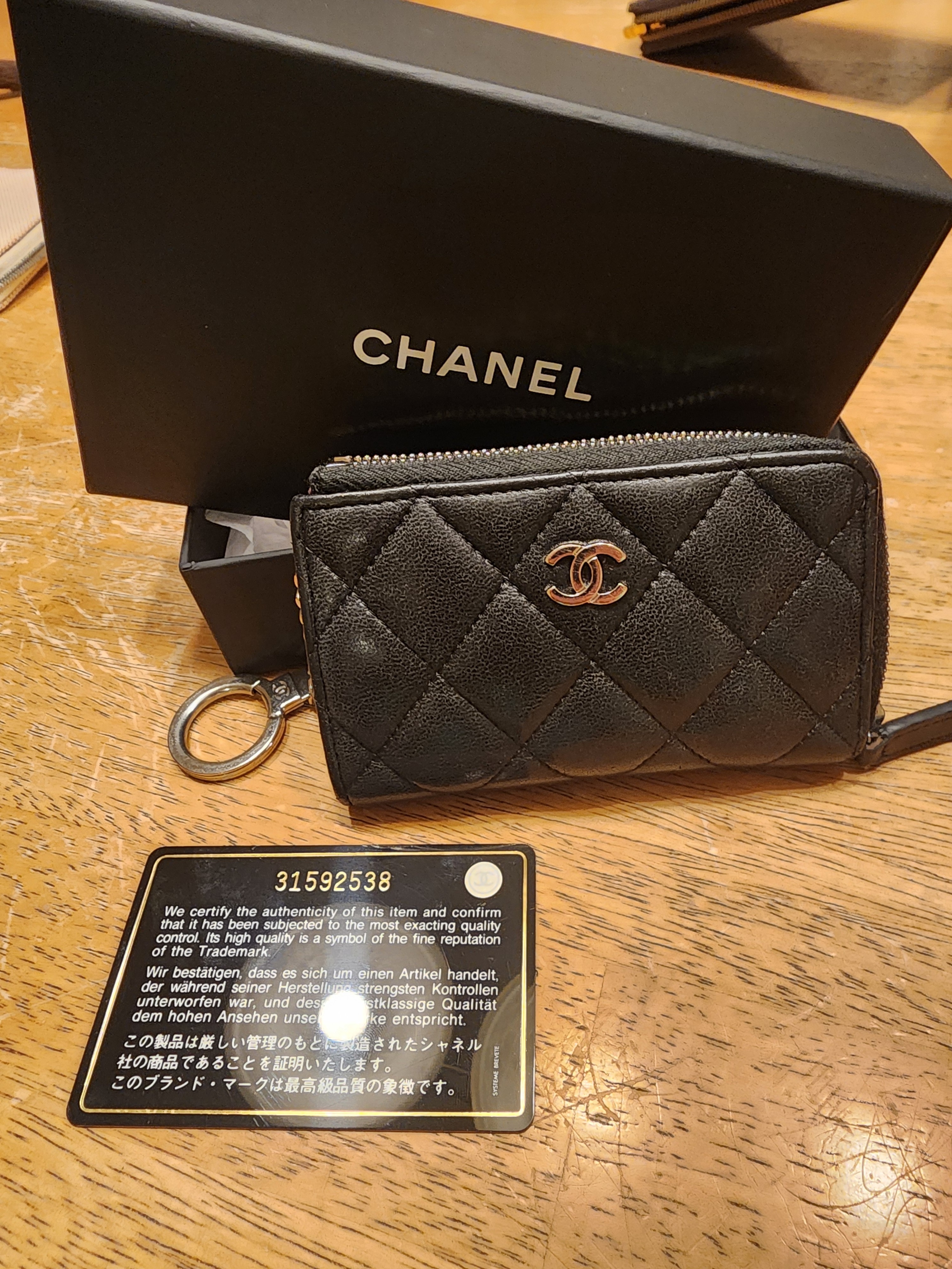 Chanel Caviar Quilted Zipped Key Holder Case In Black With A Silver Cc Logo